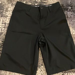 Under Armour golf shorts.
